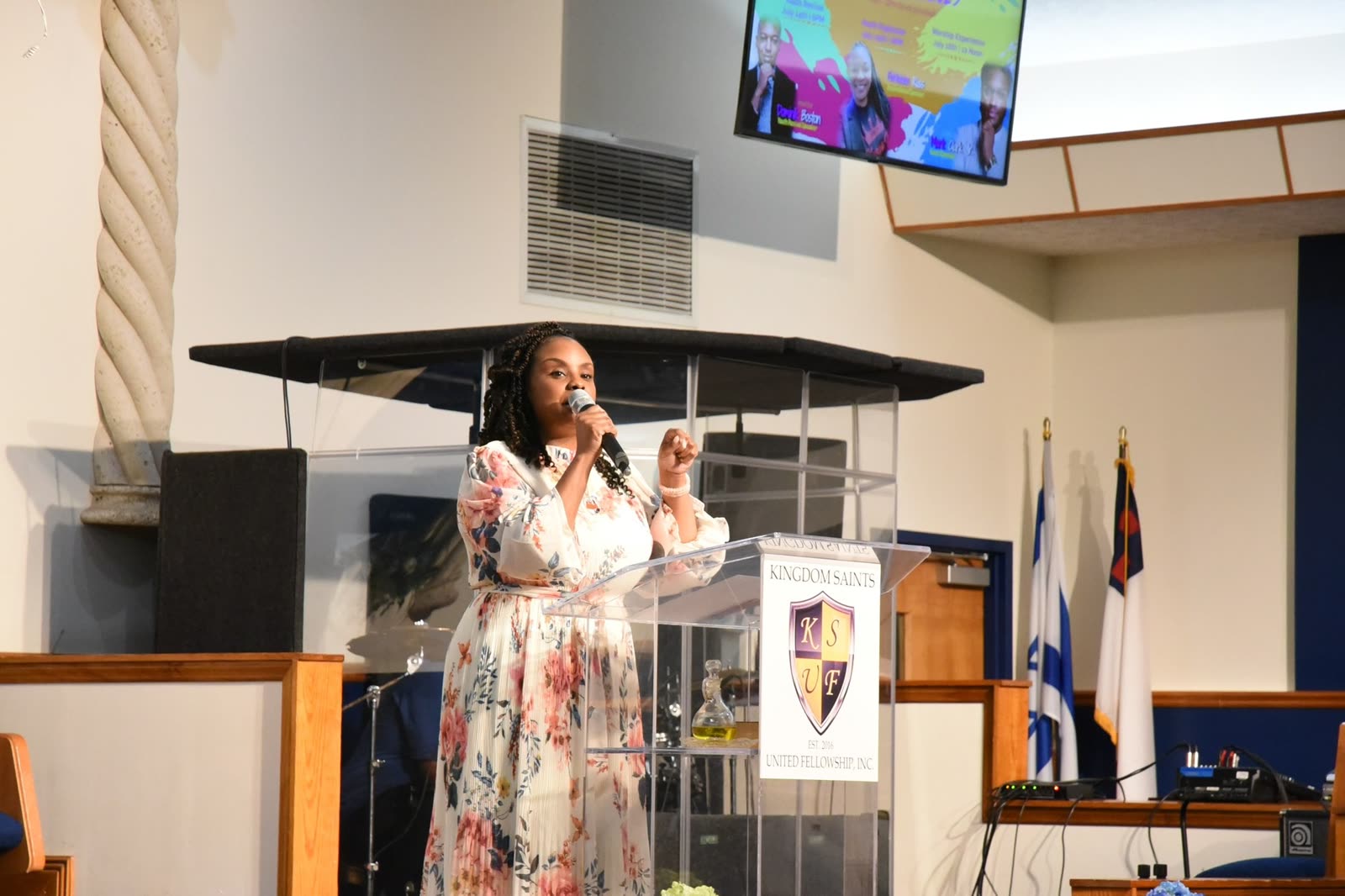 Cara preaching at the Kingdom Saints United Fellowship pulpit